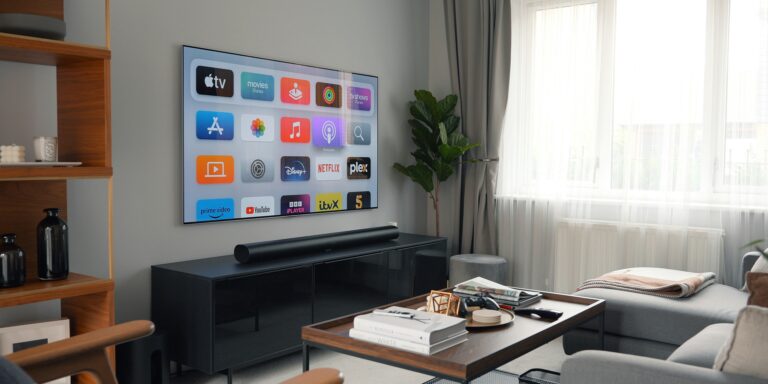 Smart TV displaying streaming apps in a modern living room
